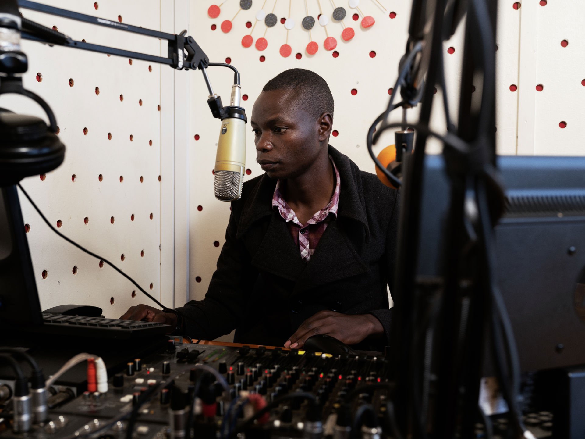 A man in a radio studio.